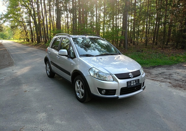 Suzuki SX4 cena 26990 przebieg: 170000, rok produkcji 2009 z Stepnica małe 379
